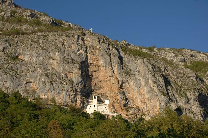 The Monastery of Ostrog is a monastery of the Serb Orthodox Church located along the almost vertical cliff, high on the mountain call Ostroska greda (beams of Ostrog) with a view of the plains