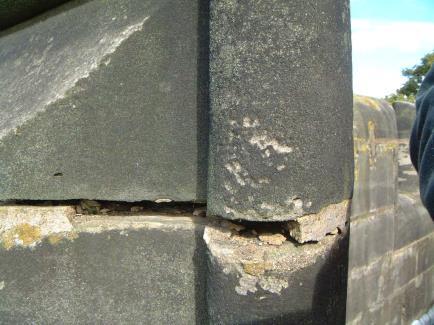 EMBEDDED METAL CRACKING IN SOUTH FACE OF