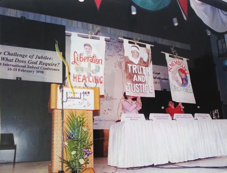 ISSUE 66, SUMMER 2013 19 Participants hold liberation and justice banners at the third International Sabeel Conference, 1998. international liberation theologians.