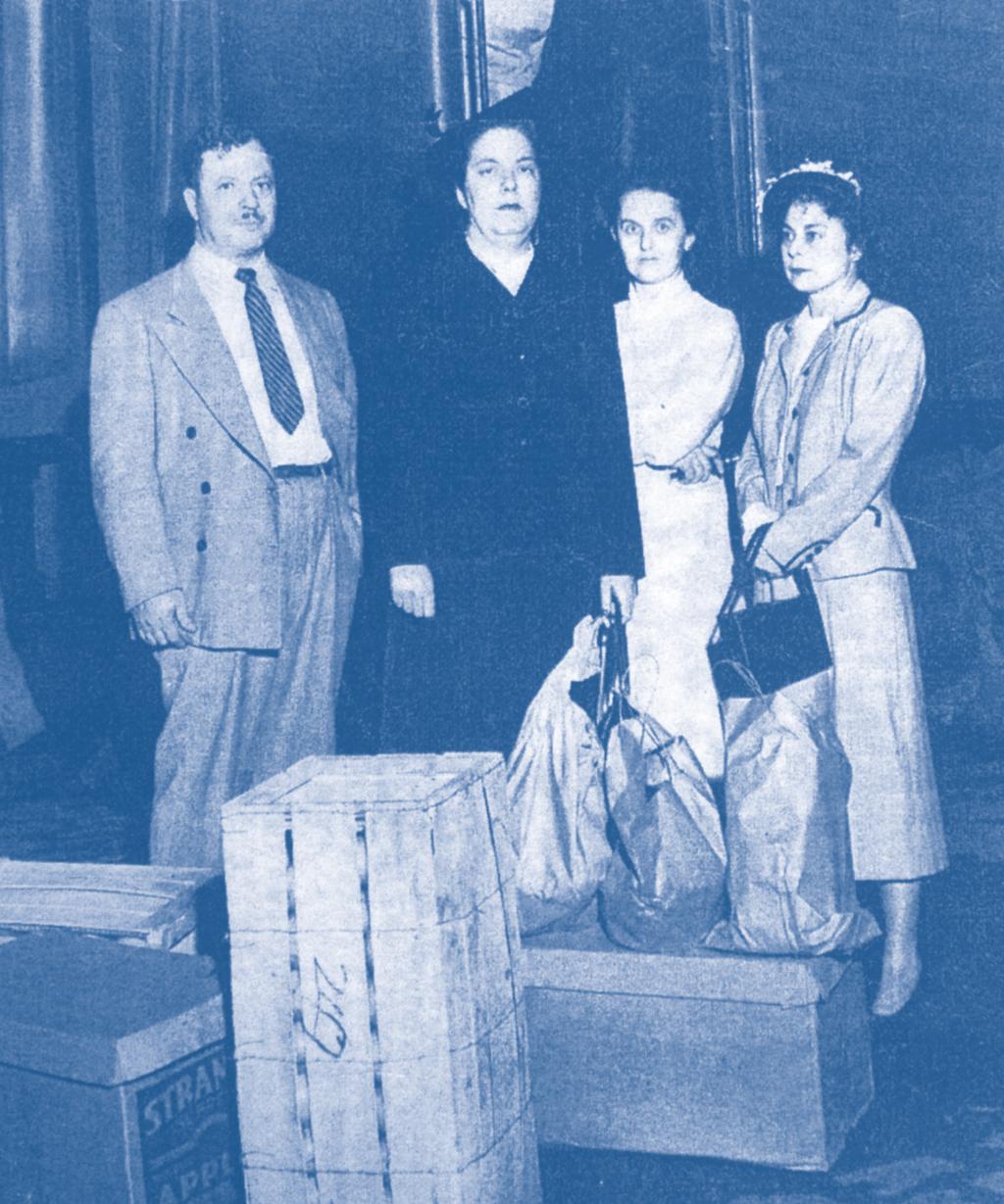Perpetuatig a Culture of Givig LEFT: This photo shows Clara Schwarz, far right, i 1948, deliverig food, medicie ad baby supplies to a trai bearig Europea immigrats.