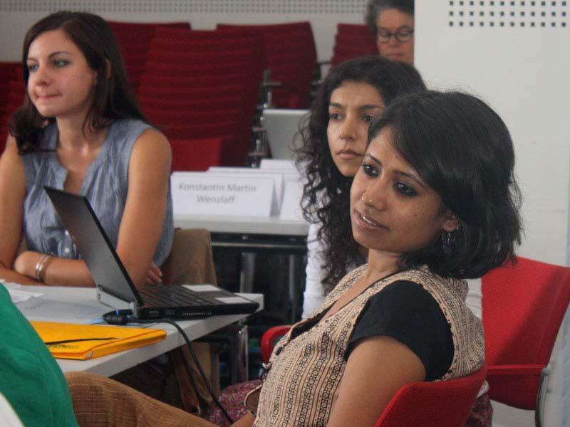 Participants listen to Kavita Singh s theses on