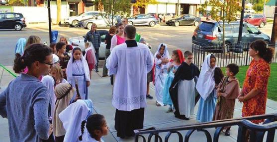 30, at the 10:00 Mass (photos, below). The children were adorable in their saint costumes.