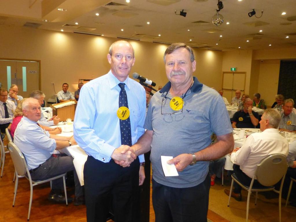 presenting Peter Bell with a cheque for $300