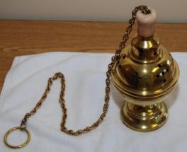 coals in a thurible (censer), becomes a fragrant cloud of smoke used to