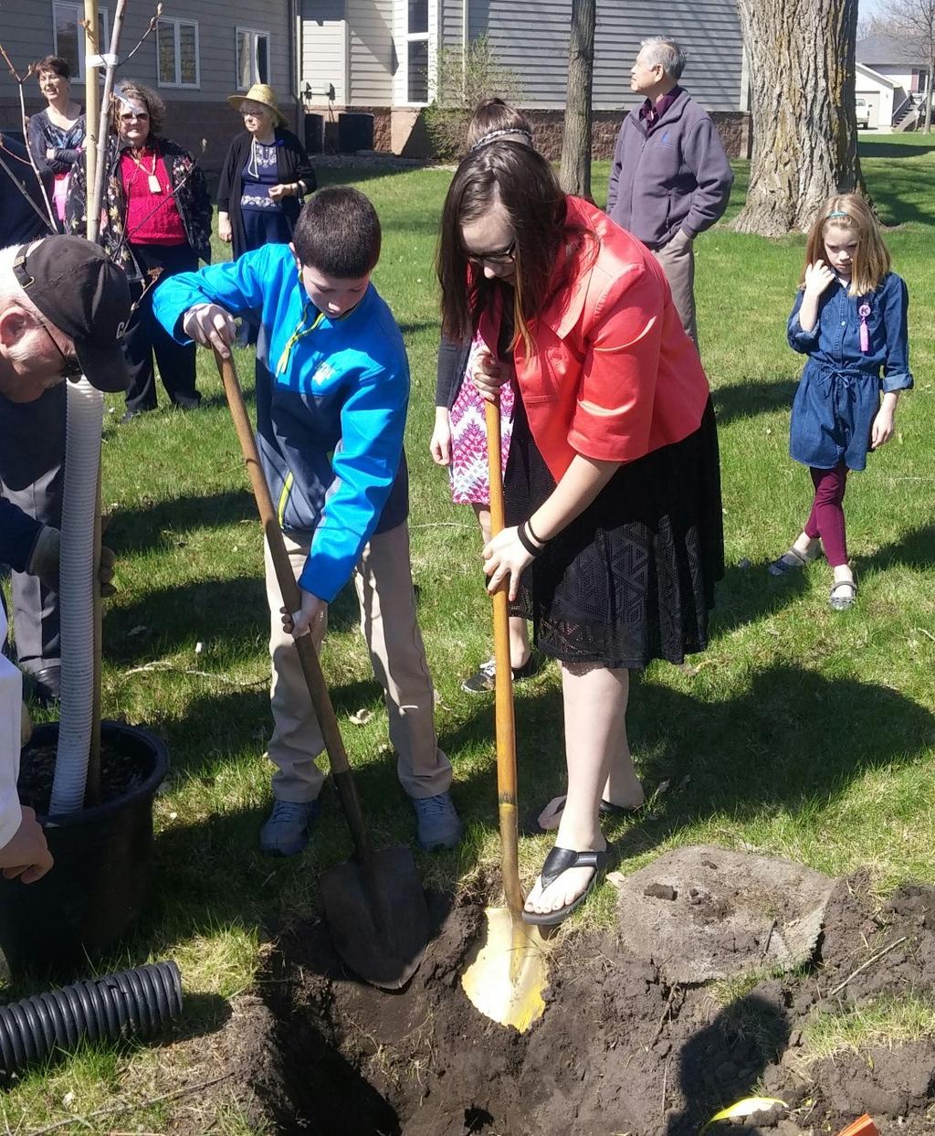 Earth Day Planting by the Youth Group, April 26, 2015. The tree is a Red Maple. What a beautiful day to celebrate with the youth.
