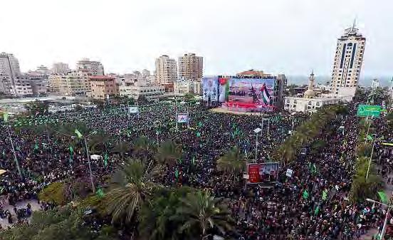 11 Right: Hamas rally in Gaza City marking the 30 th anniversary of the movement's founding (Palinfo Twitter account, December 14, 2017).