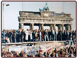 At about 11:30 PM on November 9, 1989 hundreds of thousands of people participated in tearing down the Berlin Wall and it was the point-of-noreturn in the collapse of the Cold War.