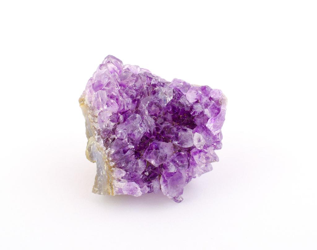 Purple Amethyst Amethyst is very well known for its protection and healing qualities! But did you know that you can activate your Crown chakra and enhance your intuition ability with it too?