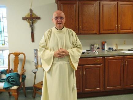 Finally, the priest adds a Chasuble in the appropriate liturgical color for