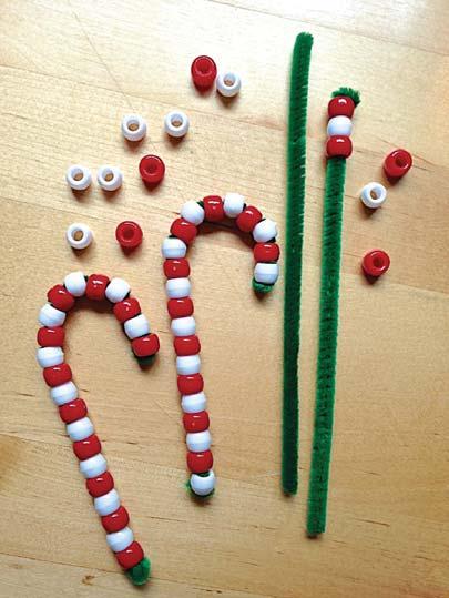 Beaded Candy Cane Ornament Pipe cleaners Red beads White beads Scissors 1. Before the event, knot one end of each pipe cleaner. 2.