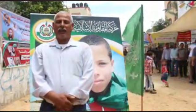 4 Right: In the video Saadi Abu Salah's father says his son always talked about his desire to become a shaheed. Behind him is the death notice issued by Hamas.