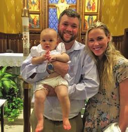 1 CONGRATULATIONS! Emily Hertel and Michael Magyar (photo 3) celebrated the Sacrament of Marriage on Sept. 22. Fr.