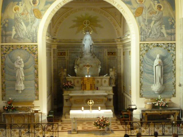 The church originated in 1870 and was dedicated in 1919. Since 1885, before construction was completed, the Blessed Sacrament has been continually on display in a monstrance above the high altar.