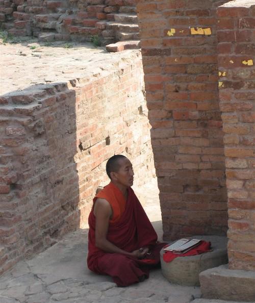 Meditation is an important practice in Buddhism. A Tibetan monk is shown here engaged in solitary meditation.