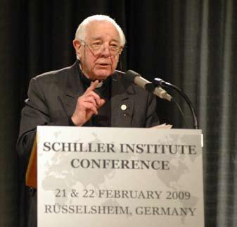 EIRNS/Christopher Lewis Father Honings, addressing the Schiller Institute conference, outlined the coherence of Lyndon LaRouche s Plan A and B for a rescue of the world economy, with the social
