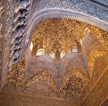 East: is the Hall of the Kings an elongated space divided into sections using a series of arches leading up to a vaulted muqarnas ceiling This room contains paintings on the ceiling representing