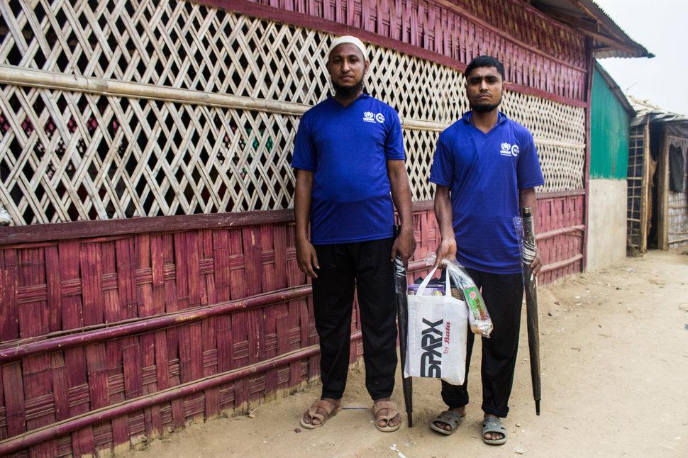 Elephant response team volunteers Jahid Hossain (left) and Mohammed Yahea (right) with equipment given to them by IUCN.