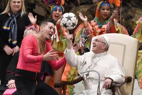 Pope Francis shows off ball spinning skills alongside circus performers Pope Francis has given a new meaning to the Hand of God as he spins a football on his finger.