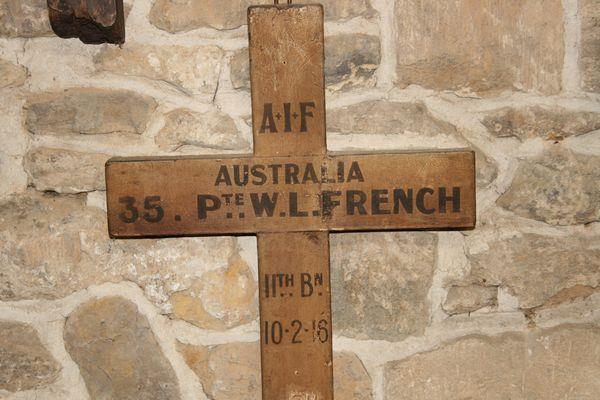 French s Original Wooden Cross Grave Marker is held inside St.
