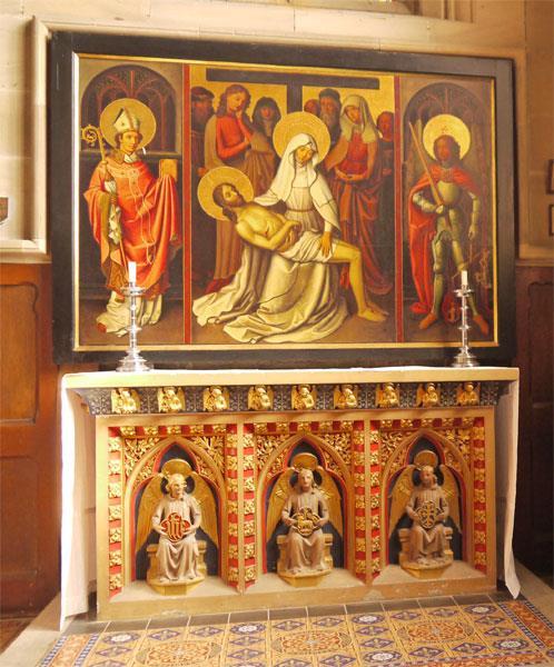 Pugin s 1842 high altar for St Peter s, Woolwich, has a characteristic tabernacle work face with seated angels bearing sculpted quatrefoil shields, but his Lady altar, depicted below, features three