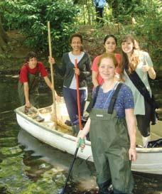 Cleaning the Manor extended to the lake where Gurukulis (Manor School graduates) manned the boats, donned waders and trudged through the lake collecting the coconuts left over from a variety of