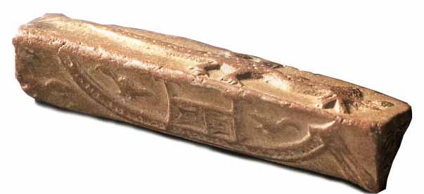 14 Fig. 1.18 This is a cylinder seal, typical of Mesopotamia, but the humped bull motif on it appears to be derived from the Indus region. Fig. 1.19 The round Persian Gulf seal found in Bahrain sometimes carries Harappan motifs.
