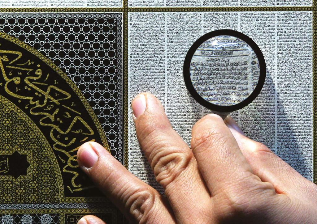 Knowledge Sub-Indicator: Research An Indonesian Muslim uses magnifying
