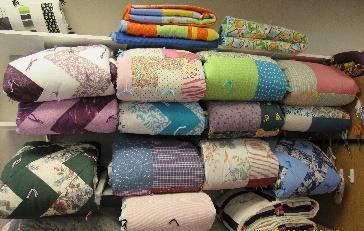 In addition to the 15 quilts for LWR, the quilters recently donated six additional quilts to LaGrave on First, two youth size to GF Social Services for foster care and four to the Northland Rescue