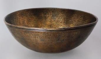 75 mm Copper alloy, cast and incised 1169 Provenance: Previously Khalili Family Collection