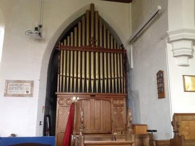 He had an organ chamber built and moved the organ (Wilkinson of Kendal - 1883) from the west end to its present position in the north