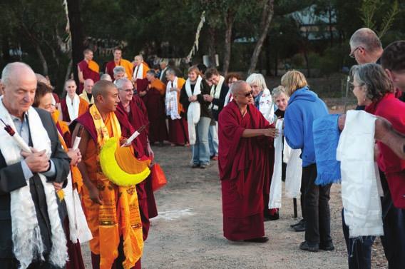 Top: Students greeting Lama Zopa Rinpoche as he arrives to teach the one-month retreat in Bendigo, Australia. Photo by George Manos. Below: Ven.