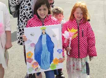 annual pilgrimage to the Knock Shrine, children drew colorful posters of Our Lady, which they then made into banners or signs, and led the rosary procession around the grounds of the Knock Basilica.
