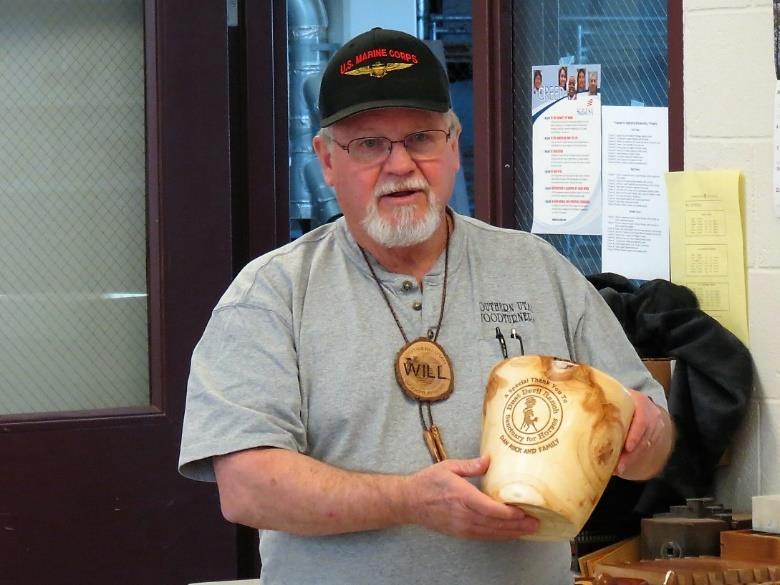 Above left is Will Arcularius showing an Aspen bowl with