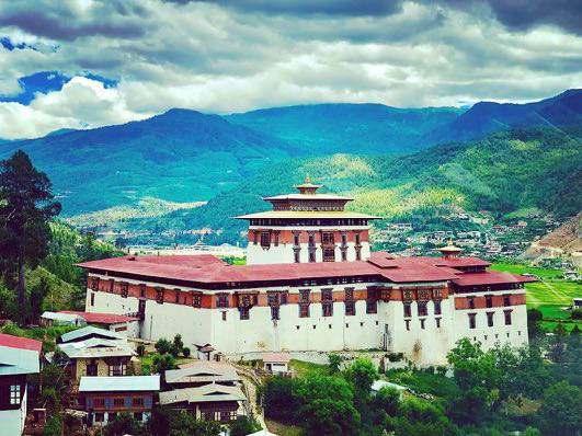 KUZU ZANGPO LA means Welcome or Hello in Dzongkha, the national language of Bhutan. The word 'Dzongkha' means the language (kha) spoken in Dzongs. (The spiritual fortresses of Bhutan.