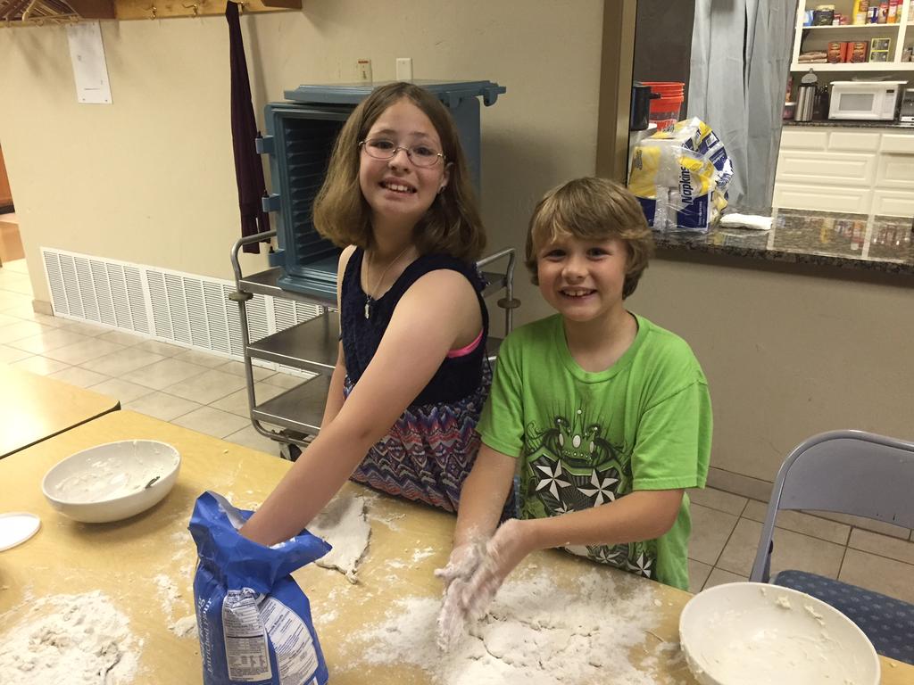 Lawson, Zander and Zoey McGormley learned how to make Communion Bread.