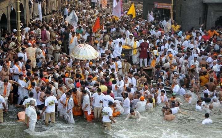 What is Kumbhmela? Hindu religious event. It is largest human congregation in the world. Takes place at 4 places, once every 12 years at each place.