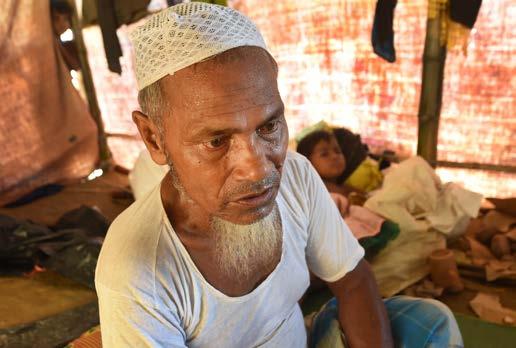Conflict Feature HAJ JAFORD ALAM said he was once the village chairman of Min Gyi, but was forced to flee after the violence in late August.