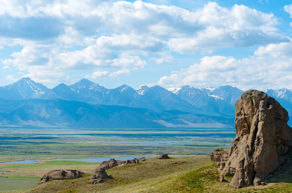 SIGHTS OF BURYATIA THE BARGUZIN VALLEY The Barguzin Valley is stretched over 200 kilometers between Barguzin and Ikat Mountain ranges.