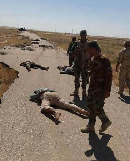15 Iraqi security personnel near the bodies of the abductees who had been executed by ISIS on the Diyala-Kirkuk highway (BasNews, June 27, 2018) The activity of the Iraqi security forces and the