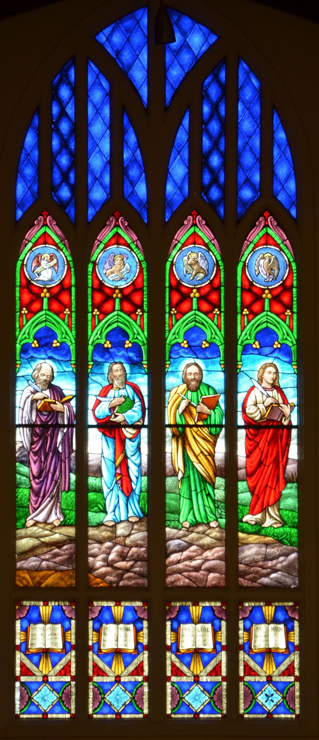 The window in the back of our sanctuary represents Matthew, Mark, Luke and John the authors of the Gospel writings in our Bible.