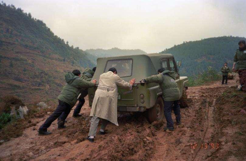 Disaster Relief in Yongshun County, Hunan Province, China Because the mountain roads were rugged, jolting, and muddy, it was difficult to