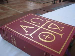 IV. Sacred Books Lectionary (Book) A liturgical book that contains the Scriptural Readings; a large red book that contains the Scripture readings.