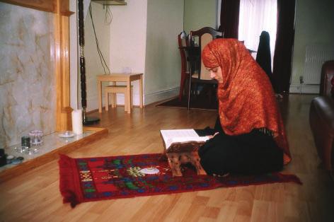 7 Question 6 Authority Look at the photograph. It shows a woman reading a holy book. 2 6 Explain why religious believers treat their holy books with respect.