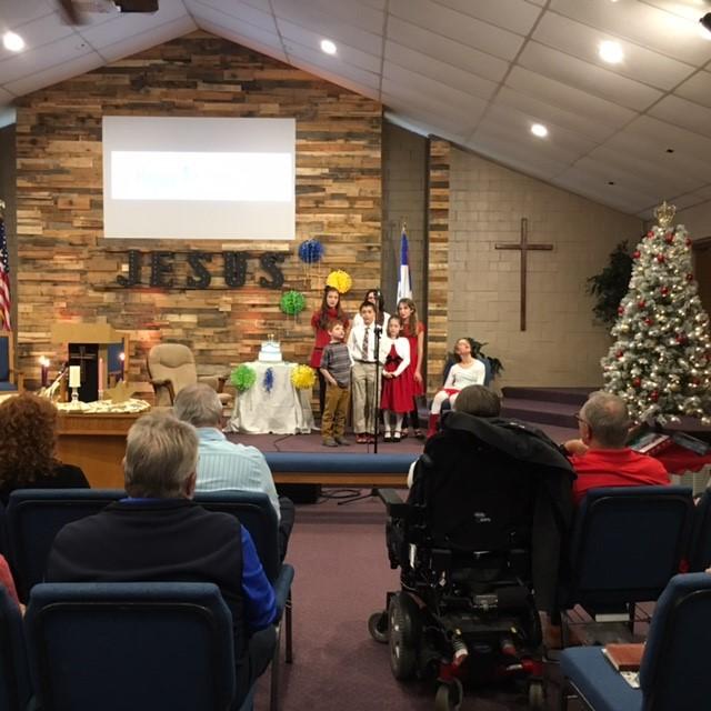 They opened Christmas presents and displayed their gifts of Jesus presence...love, Hope, Grace, Faith, Joy, and Peace and quoted Bible verses about each gift. Happy Birthday, Jesus!