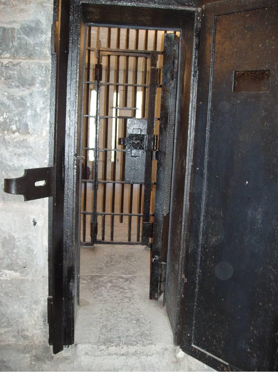 Another passage, part shown behind the bars in the center of the photo, allowed the jailer to completely encircle