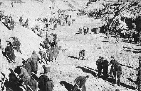 Soviet POWs at forced labor in 1943 exhuming bodies in the ravine at