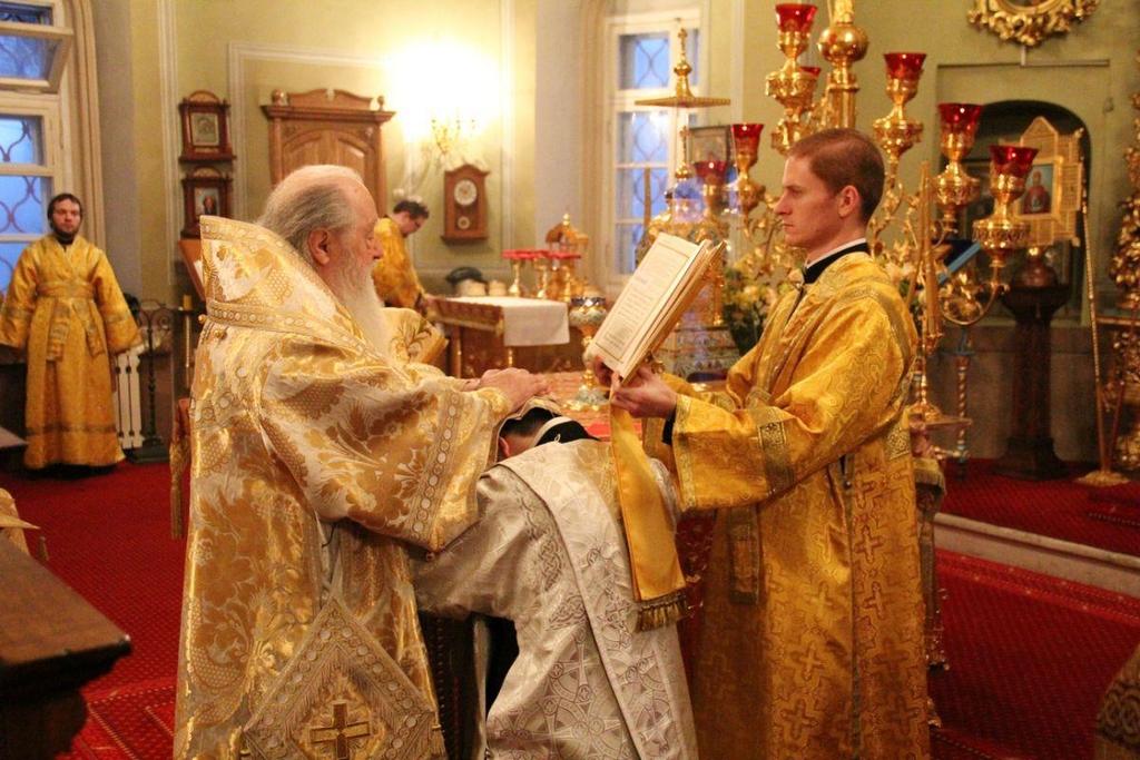 This is a deacon being ordained to the priesthood in a church in Russia.