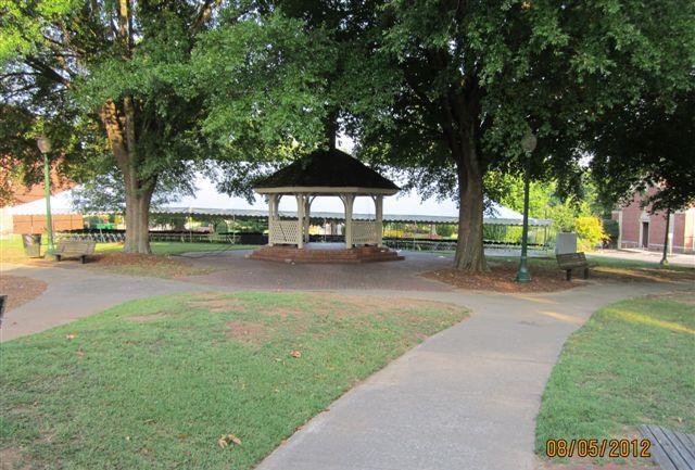 View of tent and band stand in Dalton Green Park just