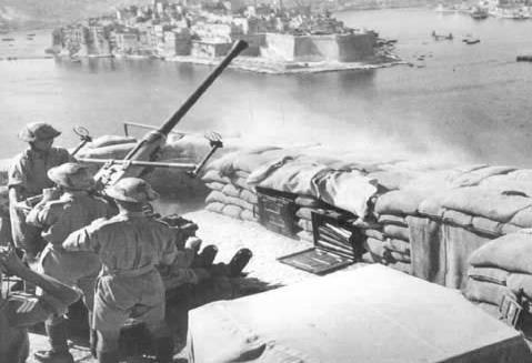 from taking off. Many buildings over Malta and especially close to the Grand Harbour were blown up and reduced to ashes with people trapped under the rubble.