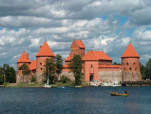 The pits where the victims were buried are still visible. In the afternoon visit Trakai and explore the Trakai Castle.